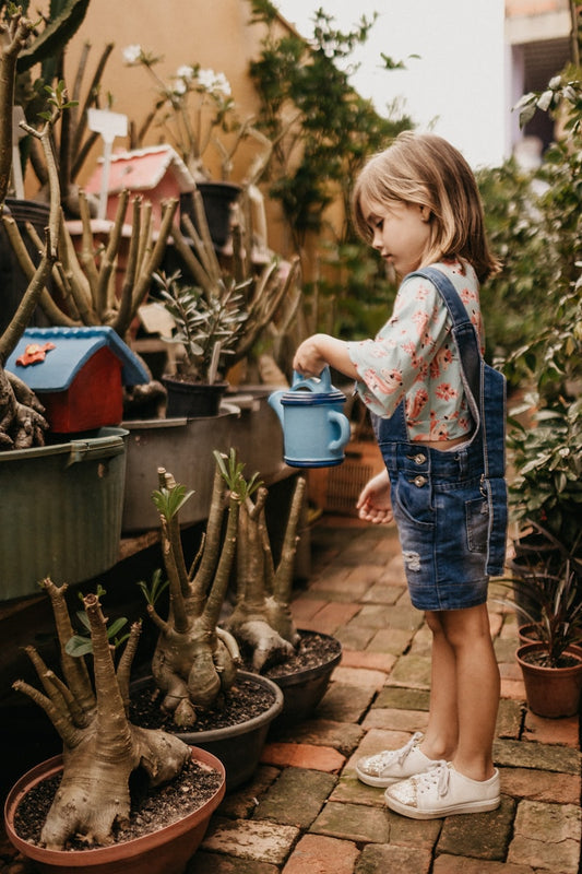 Young child playing with colorful blocks in early learning